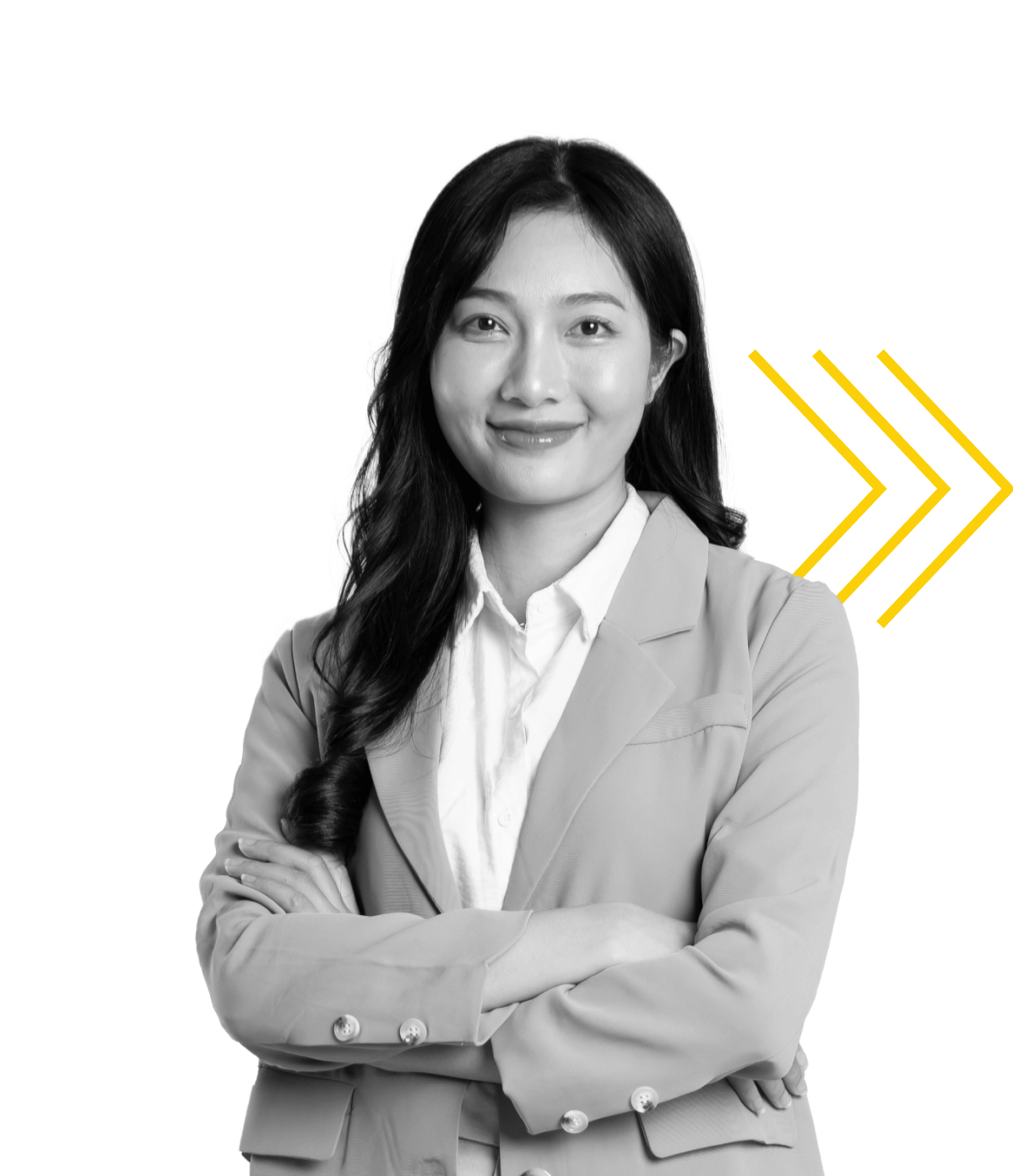 A woman in a blazer stands confidently with arms crossed, smiling. The background features a white circle and three yellow arrows pointing right. The image is in black and white except for the yellow arrows.
